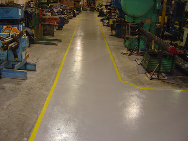 Manufacturing and warehouse flooring with safety line striping